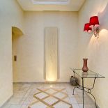 Luxusní designový radiátor Oriental z Olycale kamene - v interiéru