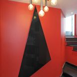 Luxusní designový radiátor Triangle z Olycale kamene - v interiéru